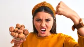 Îți crește tensiunea din cauza stresului? Calmează-te cu nuci!