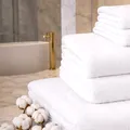 Cum să ai mereu prosoapele pufoase, ca la hotel. Trucul american cu oțet pe care puțini români îl știu