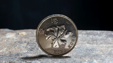 Secretul monedei găurite: de ce e bine să o porți mereu în portofel?