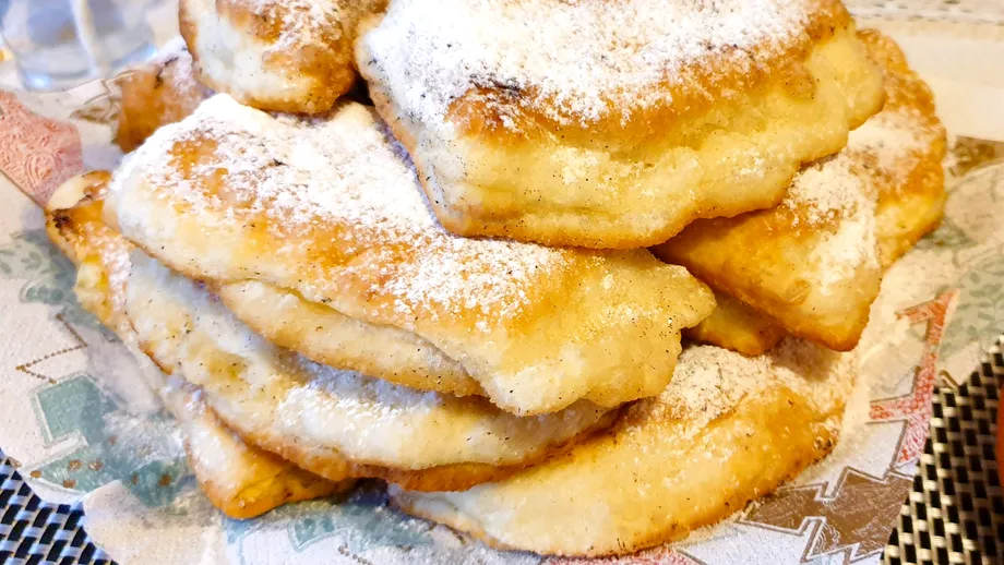 Secretul langoșilor pufoși - cum să faci acasă cele mai bune scovergi cu brânză. Nu le poți rezista!