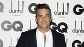 Robbie Williams a devenit tată