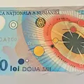 Bancnota de 2.000 de lei din 1999, vânată de colecționari. Cât poate valora astăzi moneda emisă pentru eclipsa totală de Soare