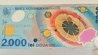 Bancnota de 2.000 de lei din 1999, vânată de colecționari. Cât poate valora astăzi moneda emisă pentru eclipsa totală de Soare