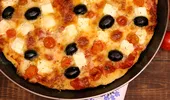 Cum gătesc grecii pizza. Ingredientul care face diferența