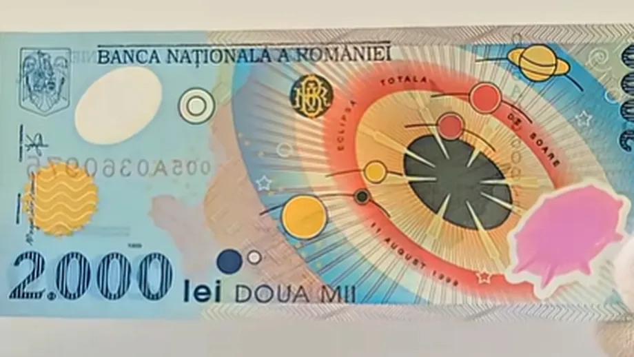 Bancnota de 2.000 de lei din 1999, vânată de colecționari. Cât poate valora astăzi moneda emisă pentru eclipsa totală de Soare