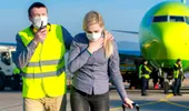 INCALIFICABIL! Un român diagnosticat cu coronavirus a zburat cu avionul de la Madrid la Bucureşti. Este cercetat penal