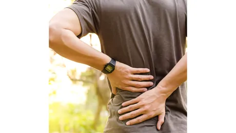 Durerile de spate, un nou simptom COVID-19