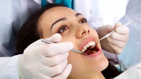 De ce merg românii la dentist?